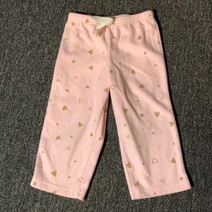 Pink pajama pants with gold hearts